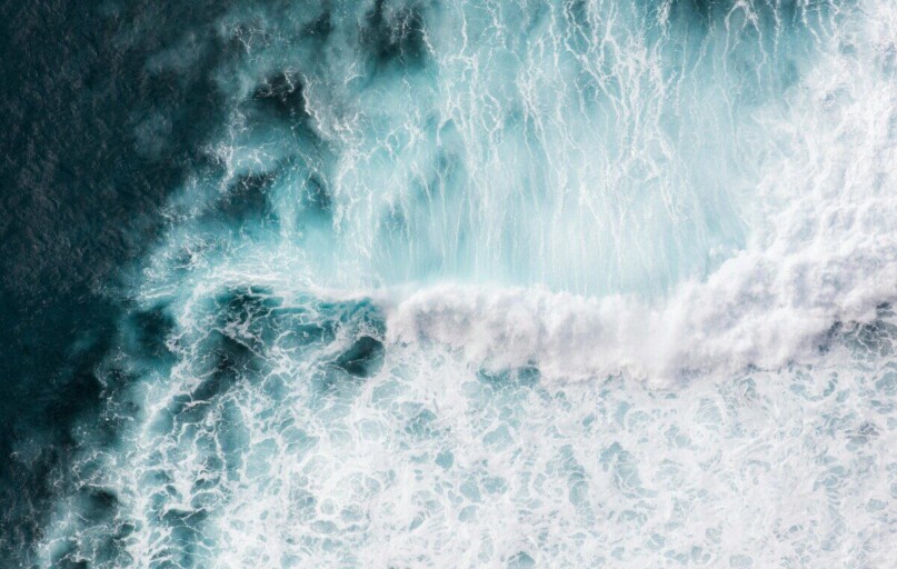 Aerial view of powerful waves crashing in the Atlantic Ocean near Madeira, Portugal.