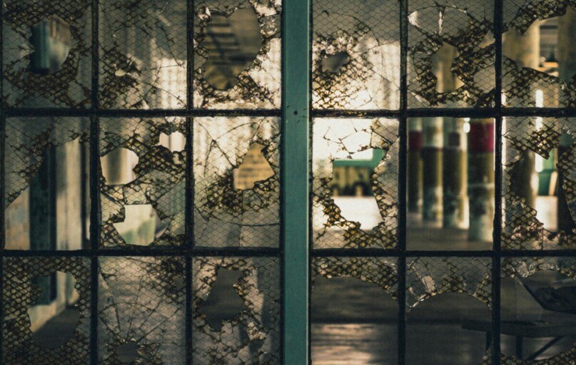 Eerie shot of shattered glass within the historic Alcatraz Prison in San Francisco.