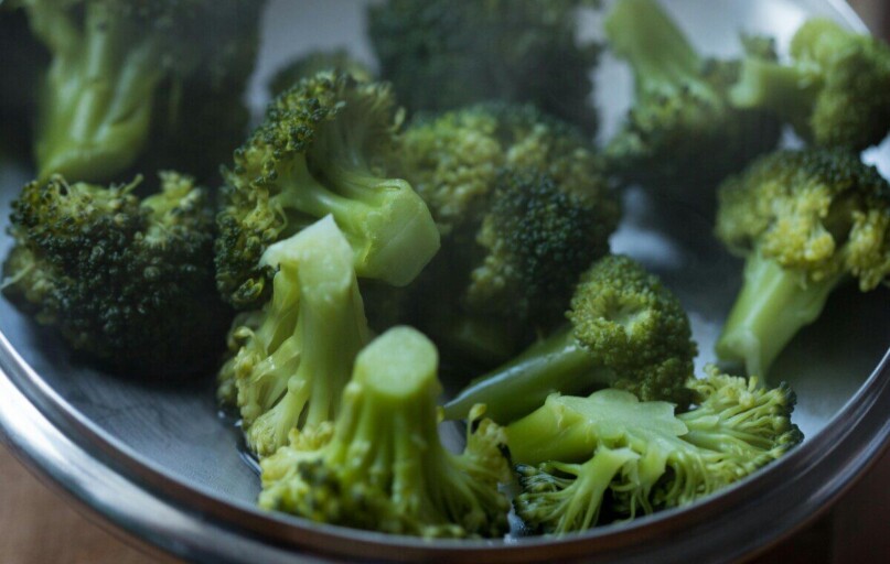 Close-up of fresh steamed broccoli, perfect for healthy meal concept.