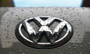 water dew on silver Volkswagen car emblem