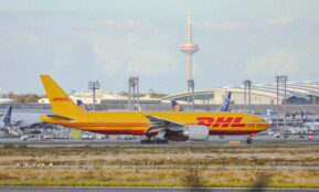 a large jetliner sitting on top of an airport runway