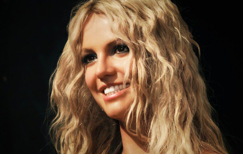 a close up of a person with blonde hair
