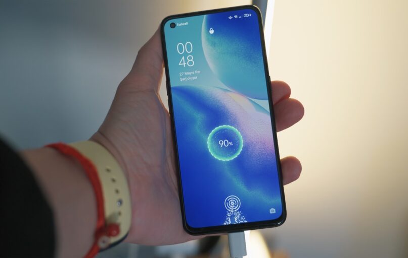 person holding black samsung android smartphone