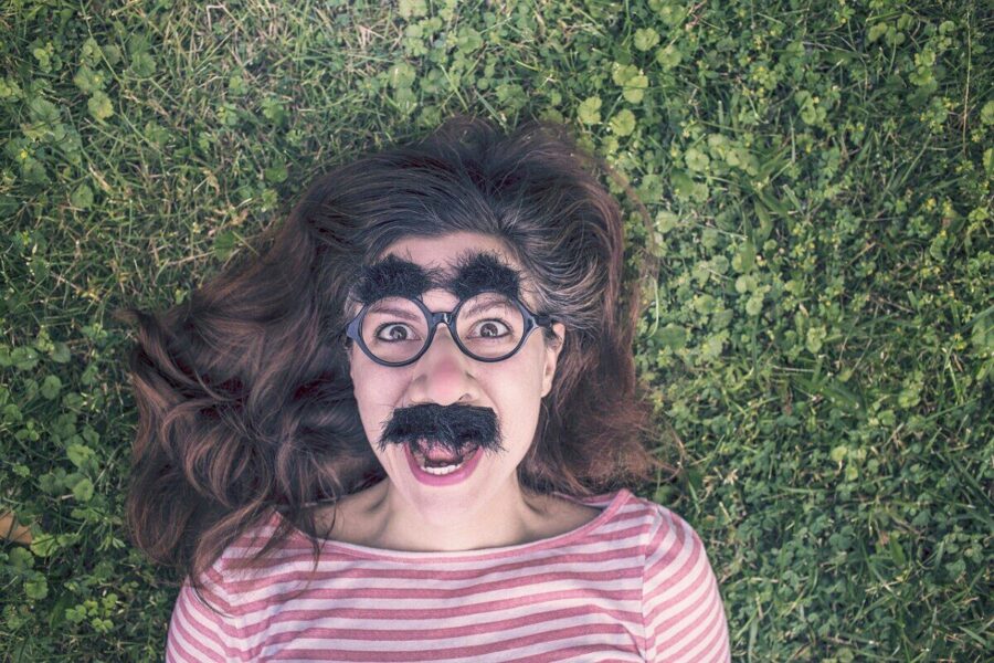 grimace, funny, expression, mask, happy, queer, people, portrait, nature, person, emotion, fun, adult, man, human, hair, face, head, happiness, cheerful, grass, girl, woman, glasses, frames, brunette, eyebrows, moustache, green happy, green grass, green funny, green portrait, green glass, green frame, green hair, green human, green glasses, green happiness, green fun