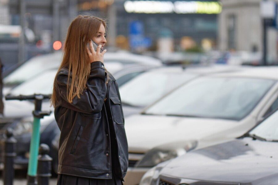 woman, talking, phone, outdoors, street, urban, cars
