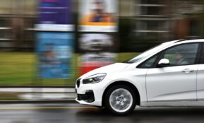white car on road during daytime