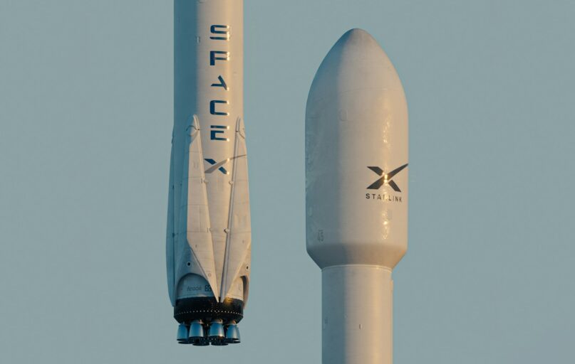 a spacex rocket is flying in the sky
