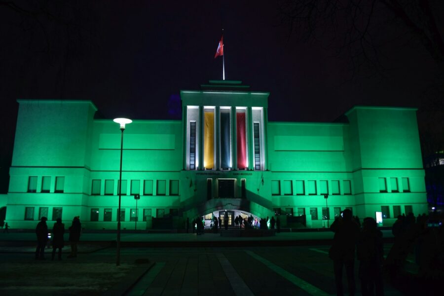 a large building with a flag on top of it