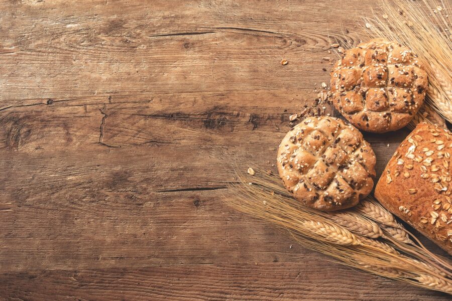 cookies, bread, and wheat on table