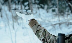 a person holding a drone