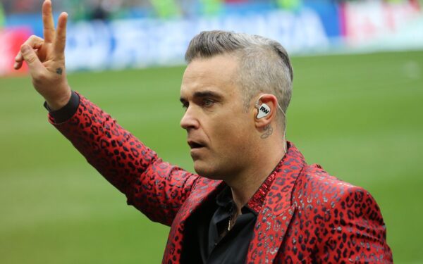 Robbie Williams įsirašė savo vardą į istoriją: sutriuškino „The Beatles“ ir tapo tikra britų legenda