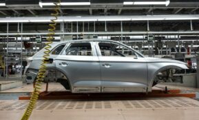 white sedan on a parking lot