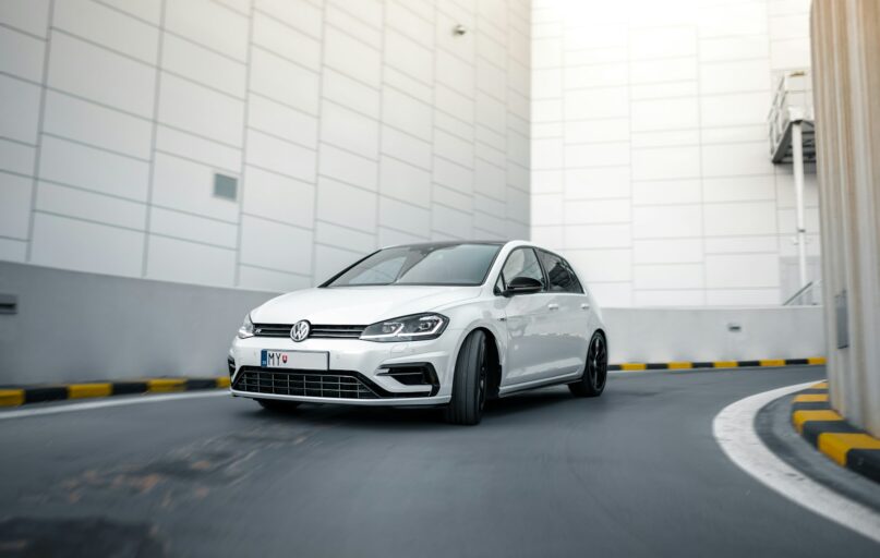 white Volkswagen vehicle during daytime