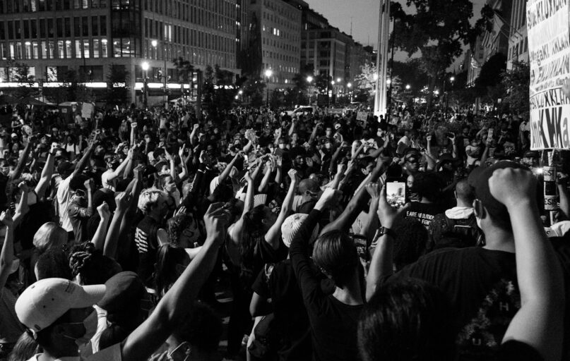 grayscale photo of people on street