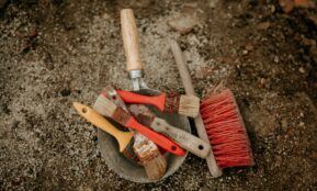 a bucket filled with different types of tools