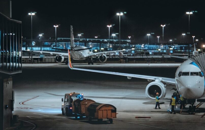 orange and black truck on road during night time