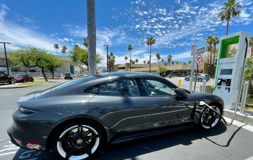 black sedan on road during daytime