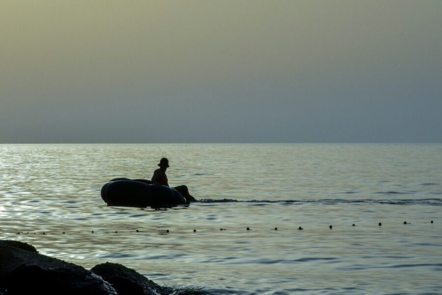 A person on a boat in the water