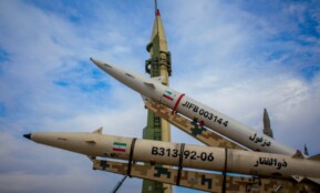 A group of fighter jets sitting on top of each other