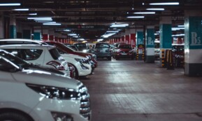 different vehicles parking on garage area of the building