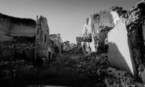 grayscale photo of concrete houses