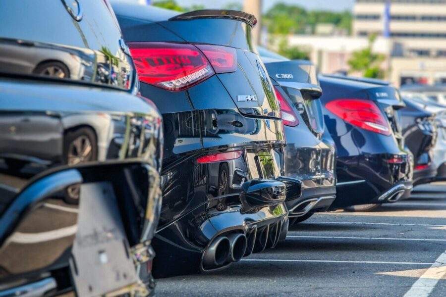 a row of parked cars in a parking lot