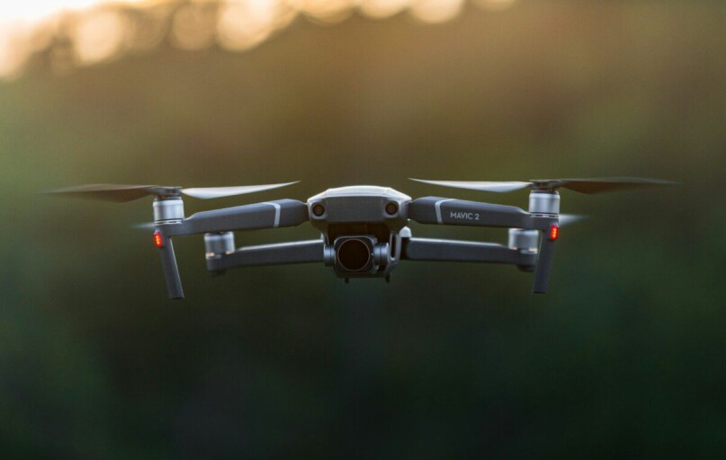 white drone in mid air