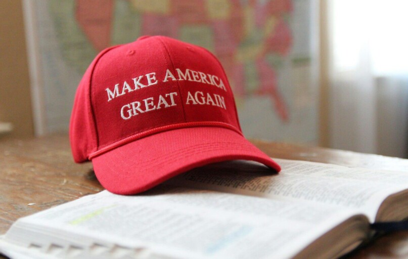 a red hat that reads make america great again
