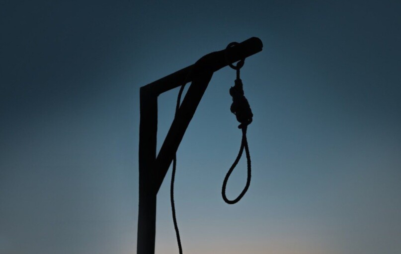 a black and white photo of a telephone pole