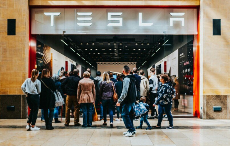 a group of people standing outside of a building
