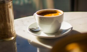 white ceramic cup on saucer
