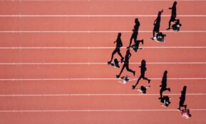 group of people running on stadium