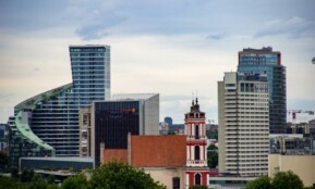brown and white concrete building during daytime