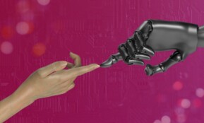 two hands touching each other in front of a pink background