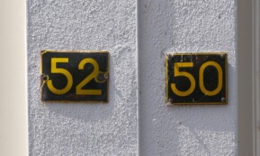 House numbers 52 and 50 are shown.