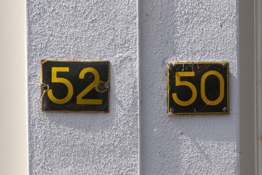House numbers 52 and 50 are shown.