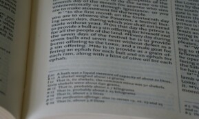 a close up of an open book on a table