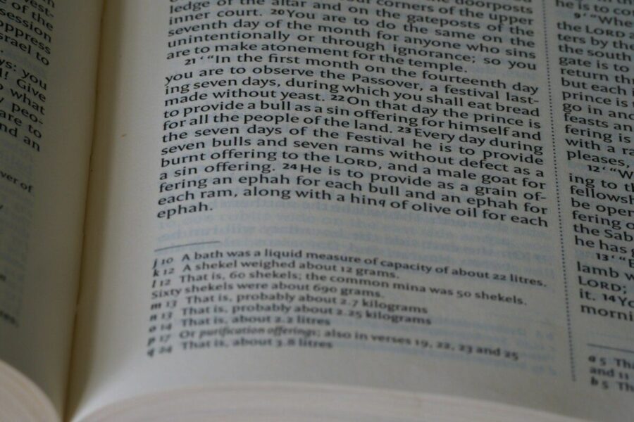 a close up of an open book on a table