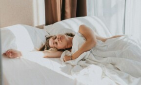 a person lying in a bed