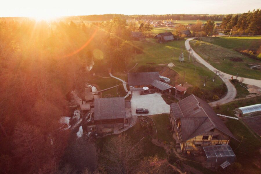 aerial photo of houses near woods