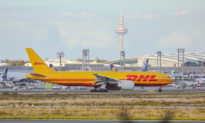 a large jetliner sitting on top of an airport runway