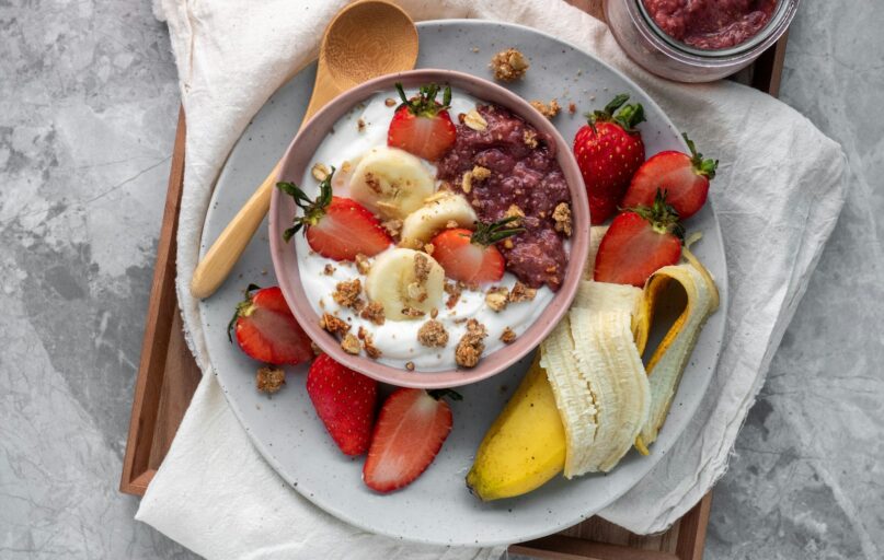 sliced fruits on white ceramic plate