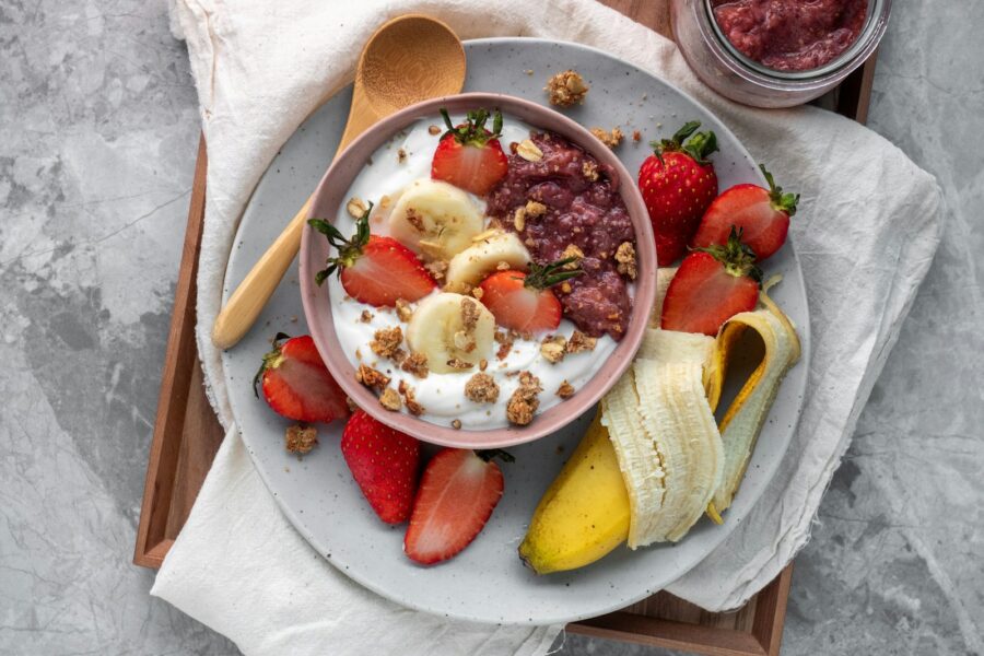 sliced fruits on white ceramic plate