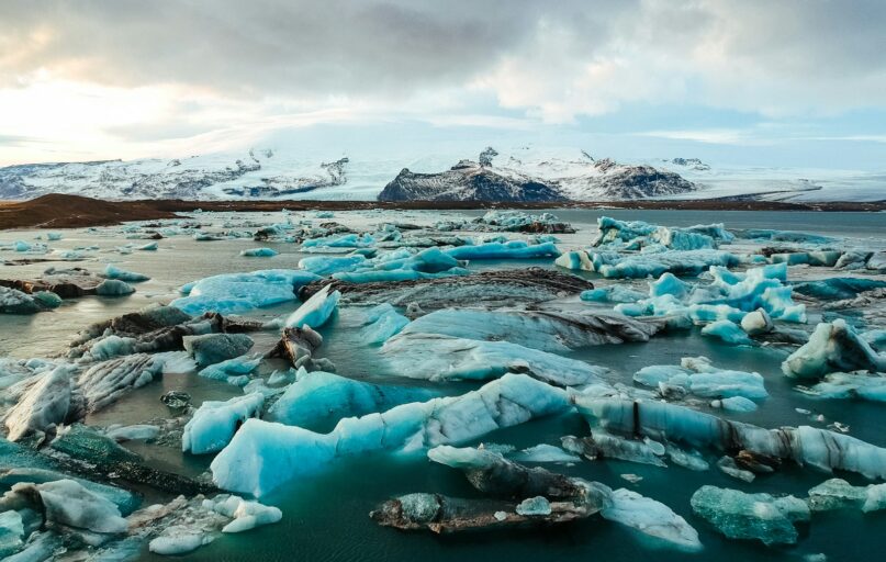 pile of ices on body of water