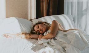 a woman lying on a bed