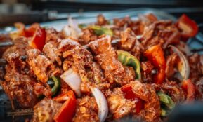 cooked food on stainless steel tray