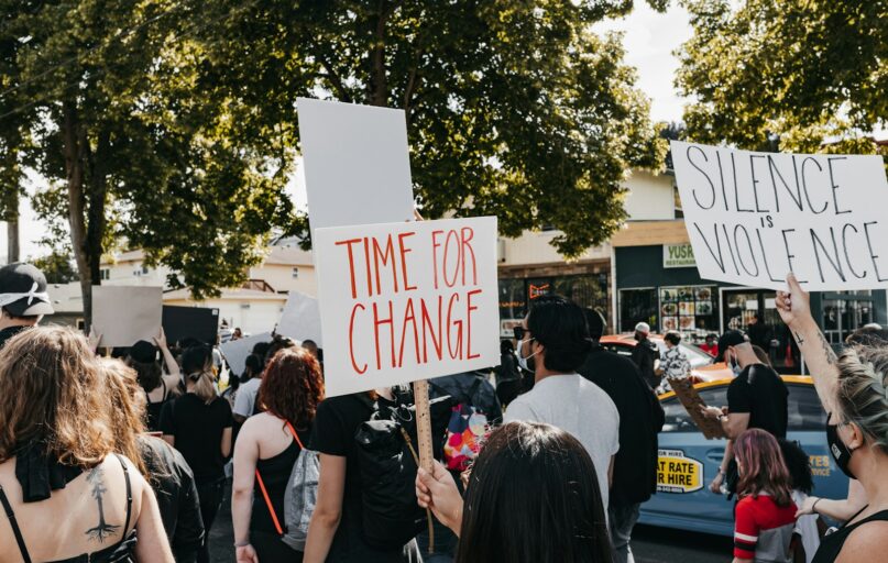 people standing on street during daytime