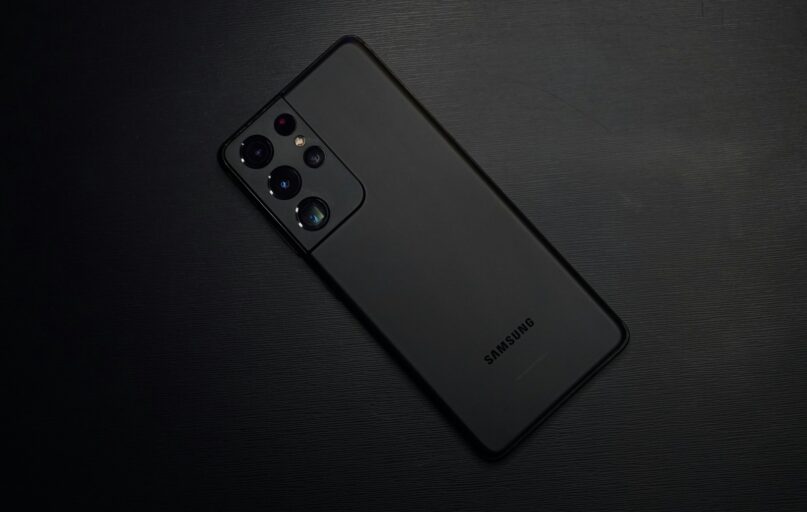 black remote control on black textile