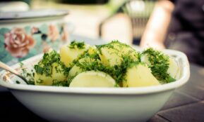 sliced cucumber on white ceramic bowl