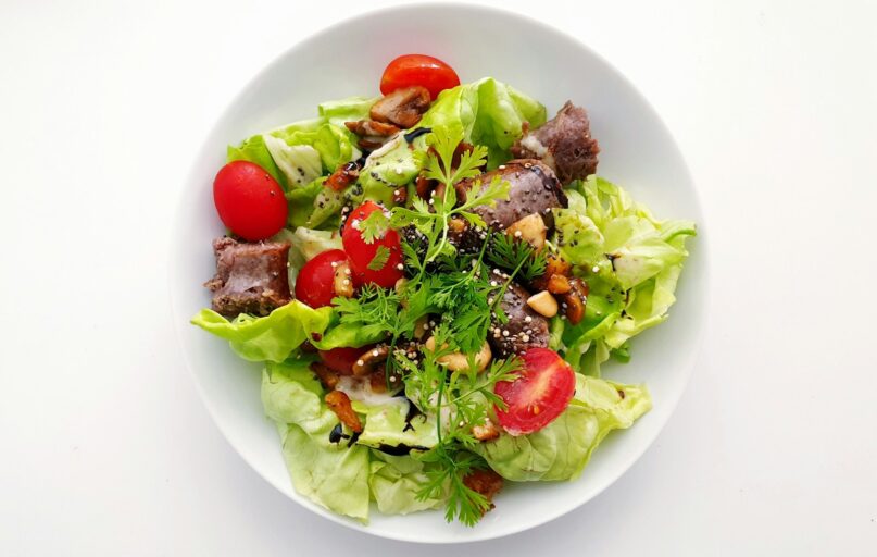 vegetable salad on white ceramic plate